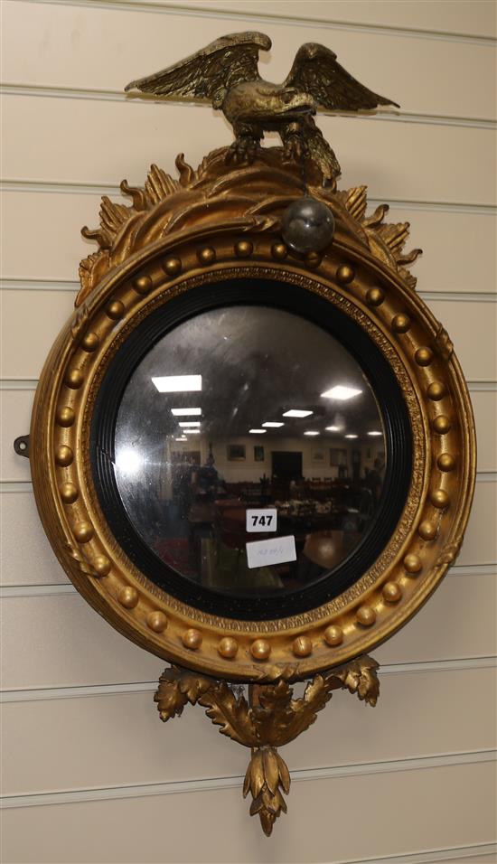 A Regency style gilt convex mirror H.78cm
